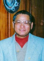 梁甦華